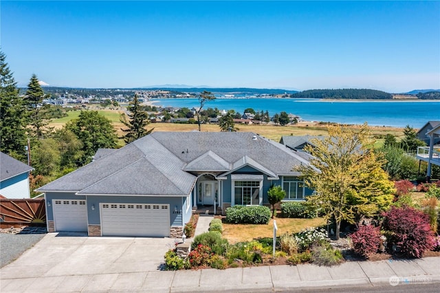 view of front of house featuring a water view