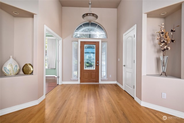 foyer with light wood-type flooring