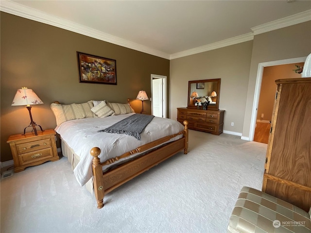 carpeted bedroom with ornamental molding