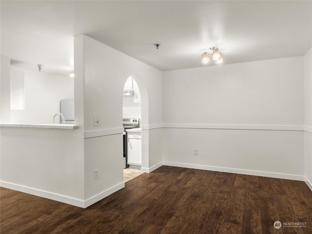 interior space featuring wood-type flooring and sink