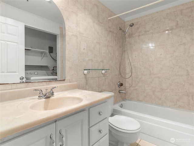 full bathroom featuring tile walls, tile patterned floors, toilet, vanity, and tiled shower / bath combo