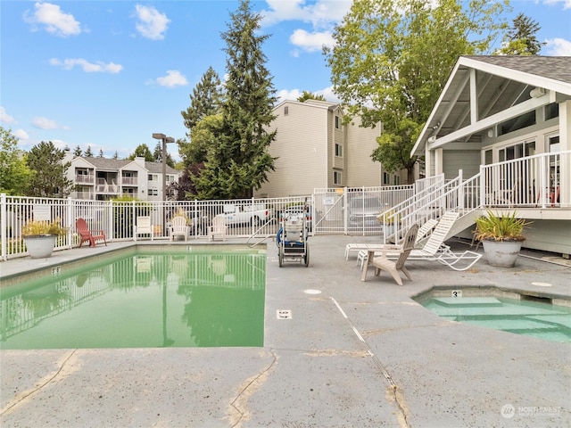 view of pool featuring a patio