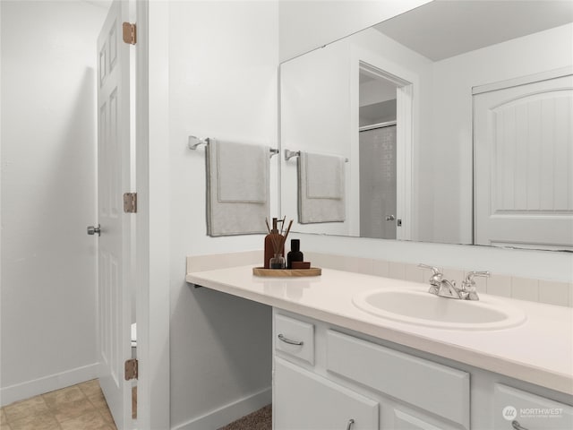 bathroom featuring vanity and tile patterned flooring