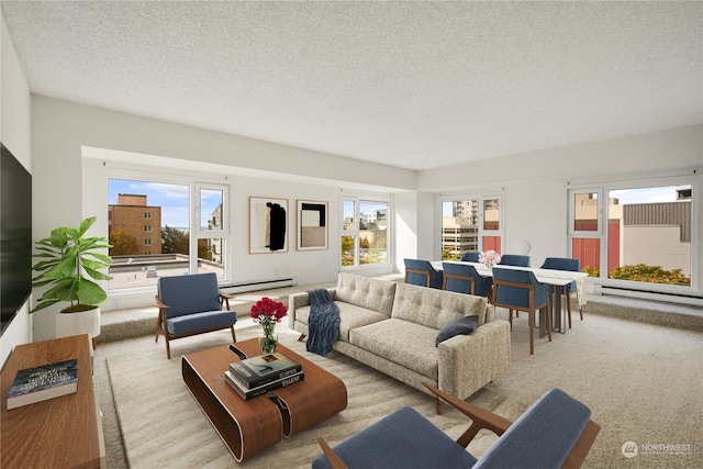 living room featuring baseboard heating, a textured ceiling, and a wealth of natural light