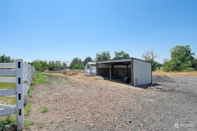 view of outdoor structure with a carport