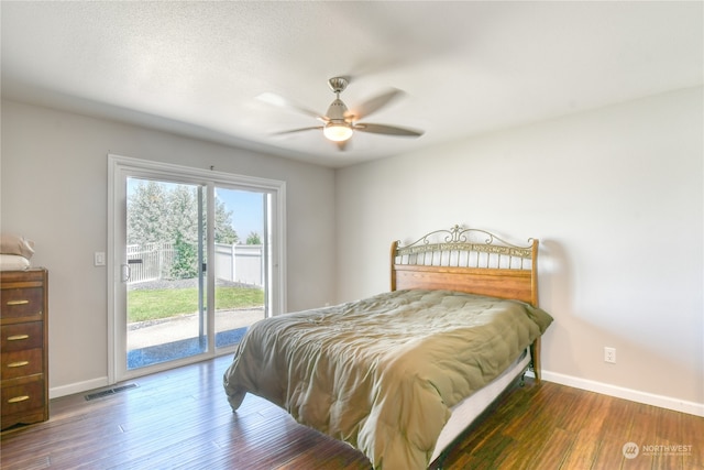 bedroom with ceiling fan, access to outside, and dark wood-type flooring