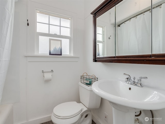 bathroom featuring sink and toilet