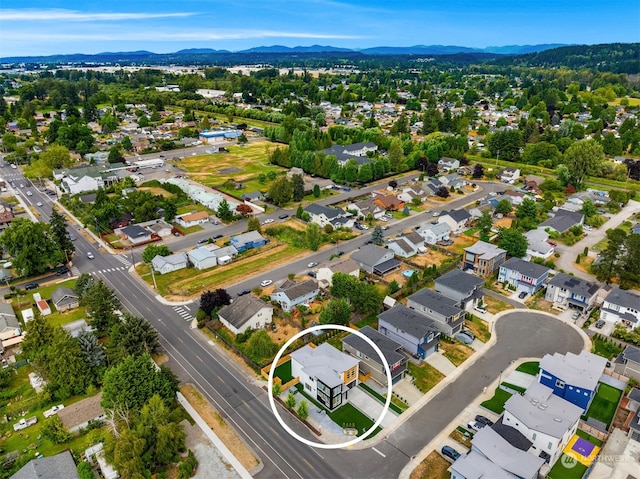 drone / aerial view featuring a mountain view