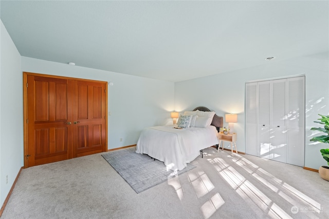 bedroom with light colored carpet