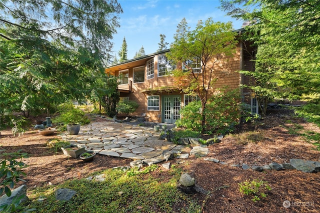 view of yard with a patio and a balcony