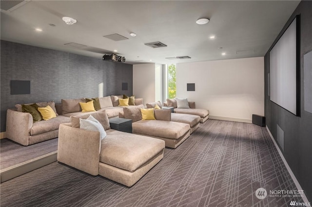 cinema room with dark colored carpet