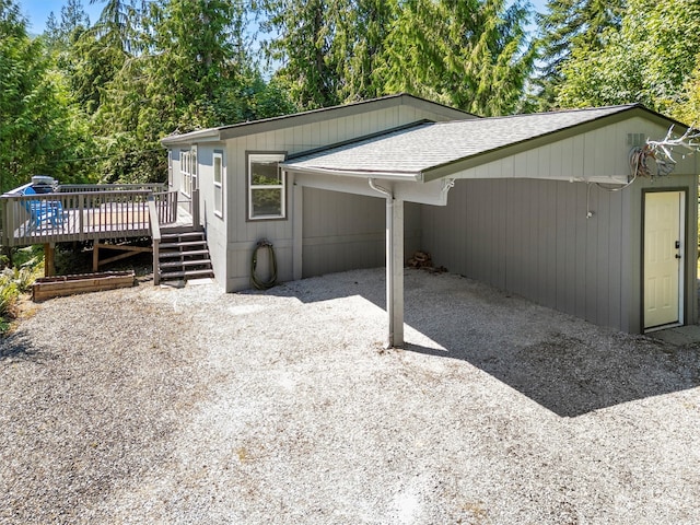 exterior space featuring a patio area and a deck