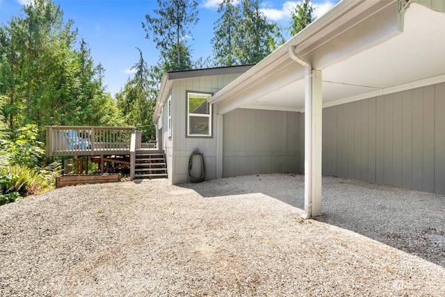 exterior space featuring a patio area and a wooden deck