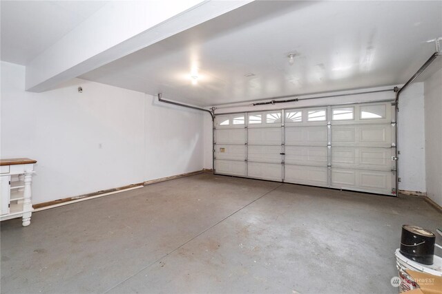 garage with baseboards