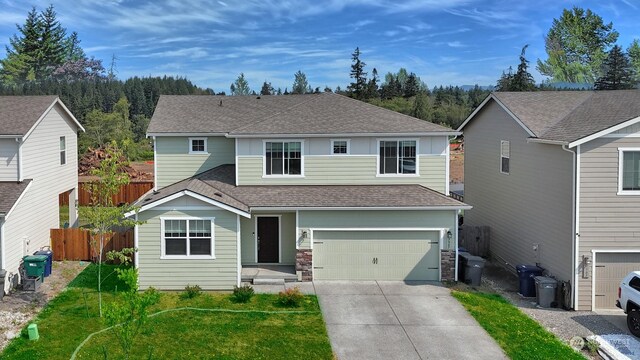 view of front property with a garage