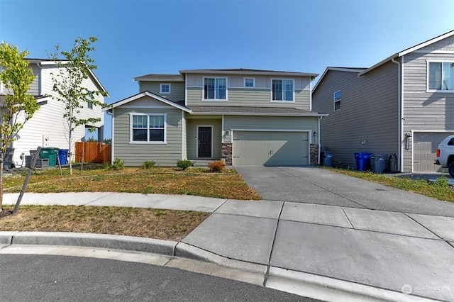 view of front of property with a garage