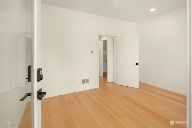 interior space with hardwood / wood-style flooring