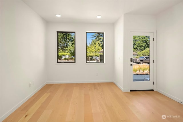 entryway with light hardwood / wood-style floors