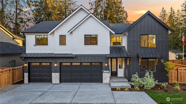 modern farmhouse featuring a garage