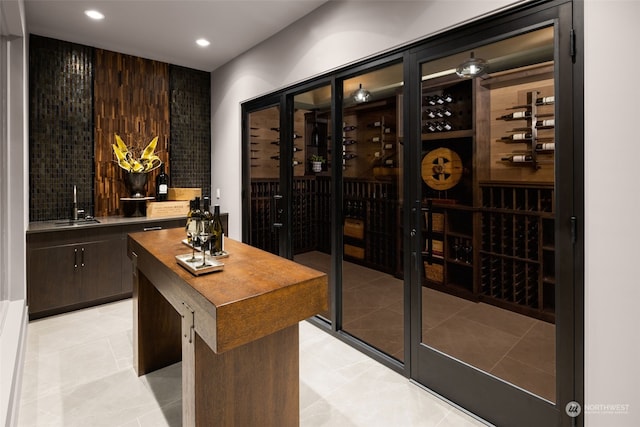 3263 Evergreen Point Rd, Medina, WA 98039 - wine room with recessed lighting and bar with sink