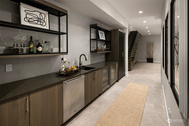 3263 Evergreen Point Rd, Medina, WA 98039 - indoor wet bar with stainless steel dishwasher, recessed lighting, beverage cooler, and light tile patterned floors
