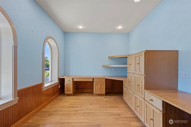 6340 Chuckanut Dr, Bow, WA 98232 - unfurnished office featuring light wood-style floors, arched walkways, recessed lighting, wainscoting, and wooden walls