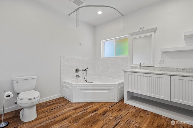 6340 Chuckanut Dr, Bow, WA 98232 - full bath with visible vents, toilet, vanity, wood finished floors, and a garden tub