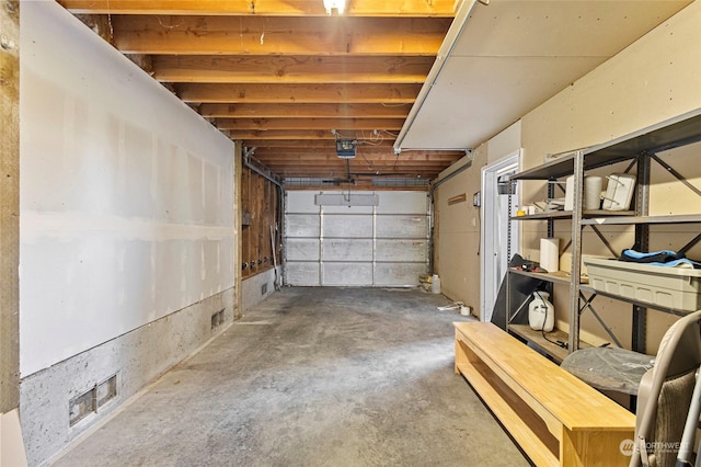 6340 Chuckanut Dr, Bow, WA 98232 - garage featuring visible vents and a garage door opener