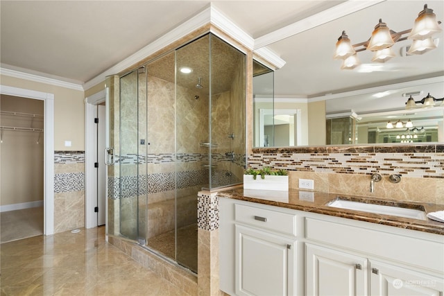 bathroom featuring vanity, ornamental molding, tile walls, and walk in shower