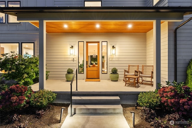 entrance to property with a porch