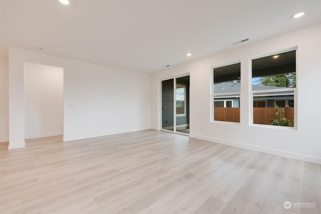29209 217th Pl SE Unit 30, Black Diamond, WA 98010 - spare room with light wood-type flooring, baseboards, visible vents, and recessed lighting
