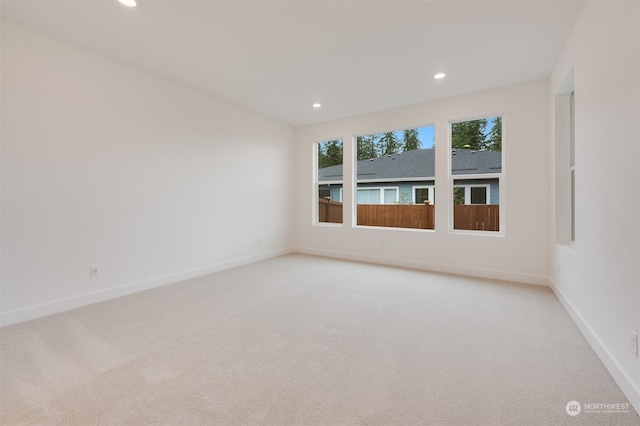 29209 217th Pl SE Unit 30, Black Diamond, WA 98010 - spare room with baseboards, recessed lighting, and light colored carpet