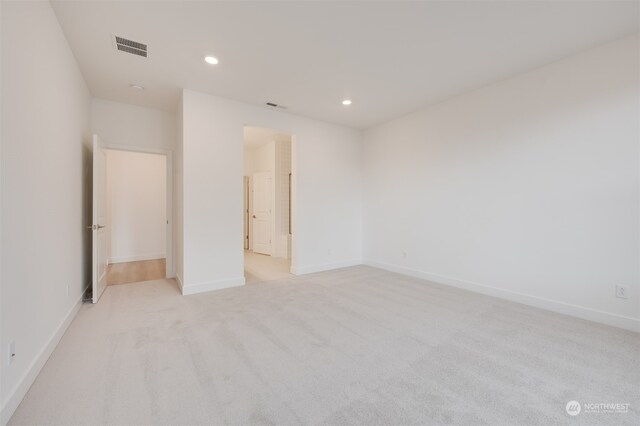 29209 217th Pl SE Unit 30, Black Diamond, WA 98010 - spare room with light carpet, recessed lighting, visible vents, and baseboards