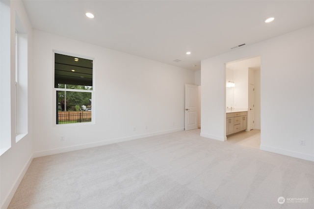 29209 217th Pl SE Unit 30, Black Diamond, WA 98010 - unfurnished bedroom featuring light carpet, baseboards, visible vents, and recessed lighting