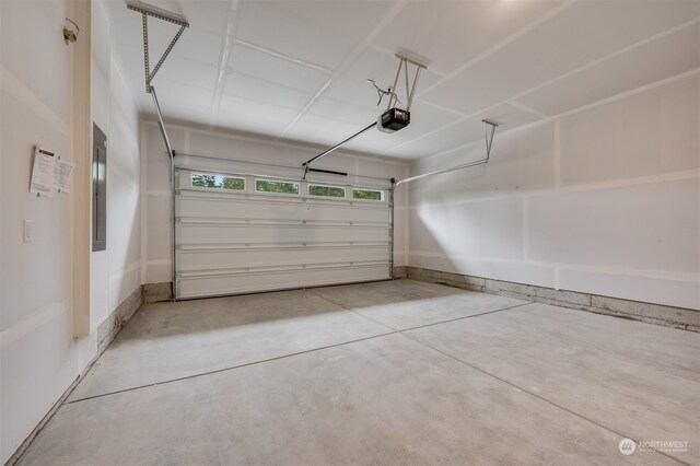 29209 217th Pl SE Unit 30, Black Diamond, WA 98010 - garage featuring a garage door opener and electric panel