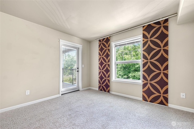 empty room featuring carpet flooring