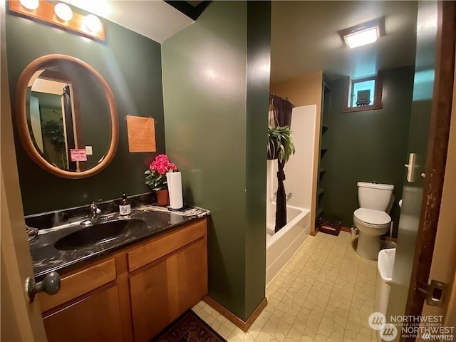 full bathroom featuring vanity, toilet, and shower / bath combo with shower curtain