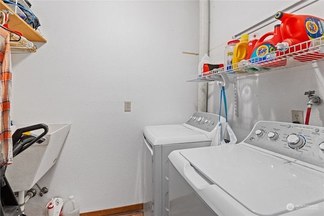 washroom with washer and clothes dryer