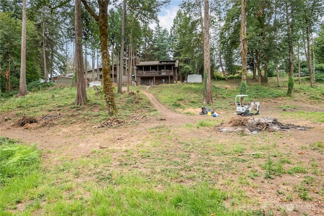 view of yard with a wooden deck