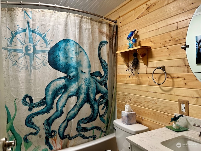 full bathroom featuring toilet, wood walls, shower / tub combo with curtain, and vanity