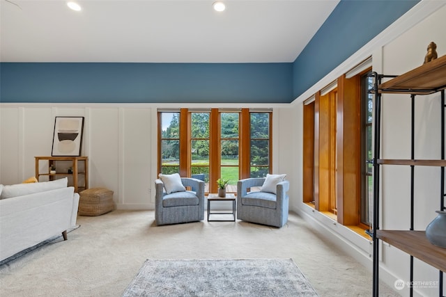 sitting room featuring carpet