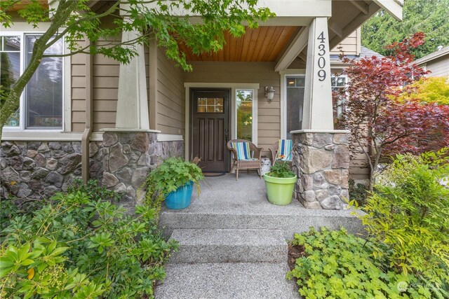 property entrance featuring covered porch