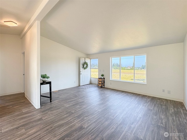 unfurnished room featuring high vaulted ceiling and hardwood / wood-style flooring