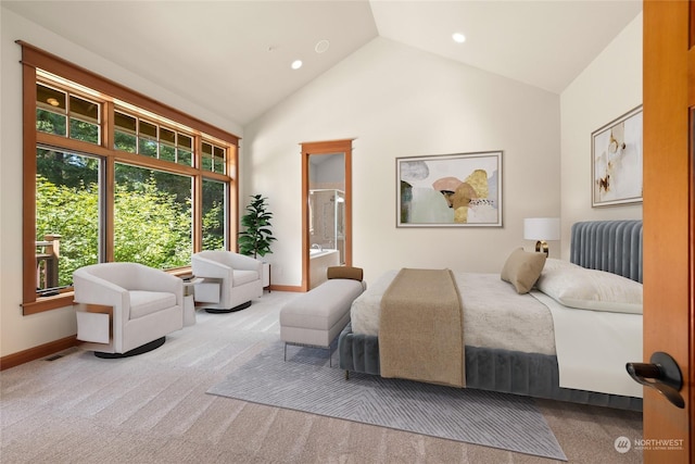 carpeted bedroom with high vaulted ceiling, recessed lighting, visible vents, baseboards, and ensuite bath