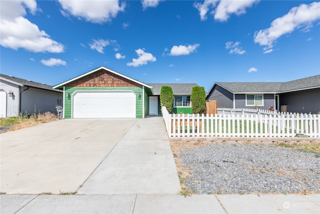 ranch-style home with a garage