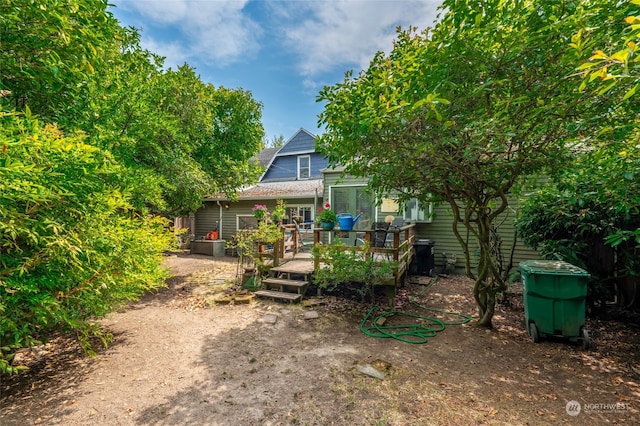 rear view of house with a deck