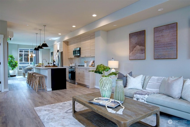 living room featuring light wood-type flooring