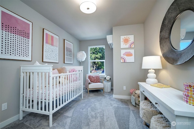 carpeted bedroom with a nursery area and a wall mounted air conditioner