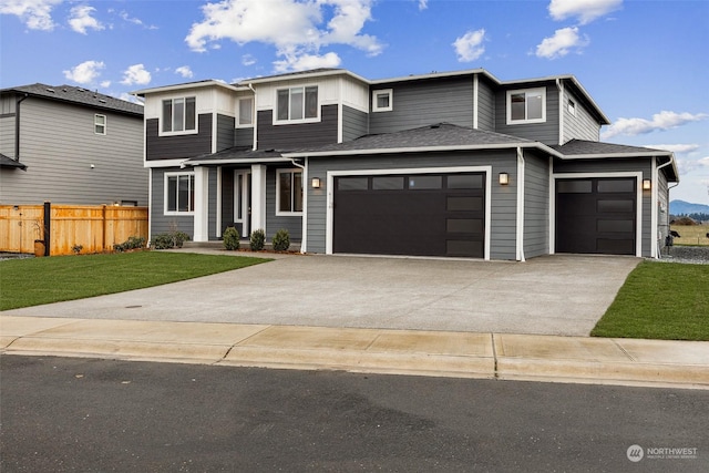 prairie-style home featuring a front lawn