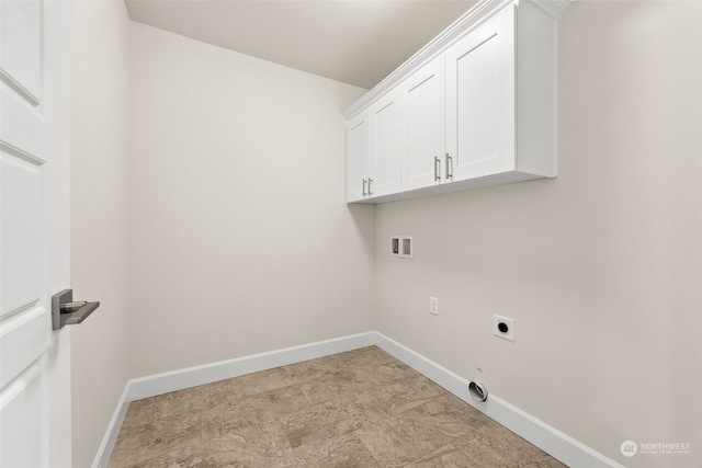 laundry room featuring cabinets, electric dryer hookup, and washer hookup